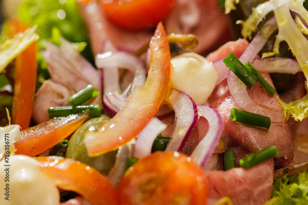 Fresh Vegetable Salad on black plate Fresh Vegetable Salad on black plate