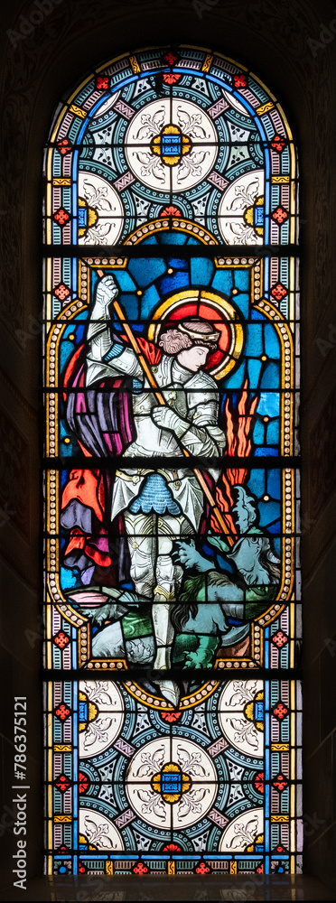 Saint Michael the Archangel. A stained-glass window in Église de la Sainte-Trinité (Holy Trinity Church) in Walferdange, Luxembourg.