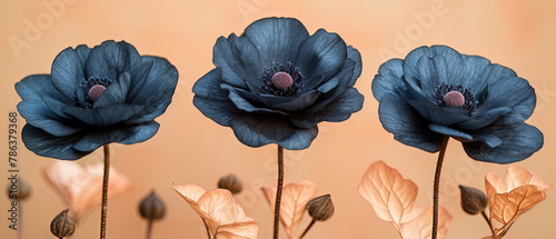 a three blue flowers that are on a stem © Masum