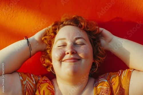 photo of a happy plus-size smiling woman 
