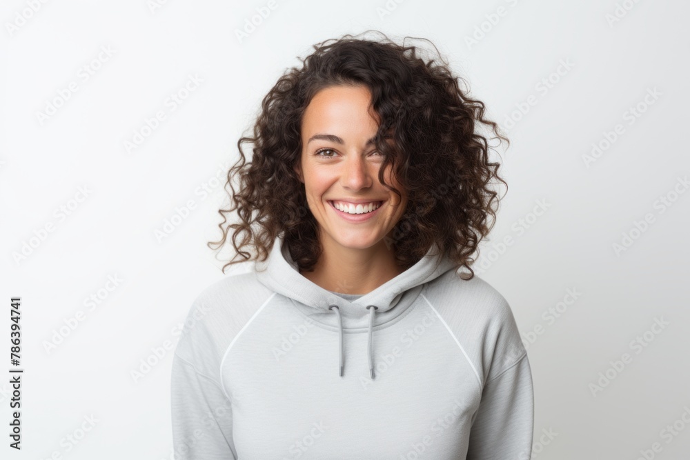 Portrait of a satisfied woman in her 30s wearing a thermal fleece pullover in white background Portrait of a satisfied woman in her 30s wearing a thermal fleece pullover in white background