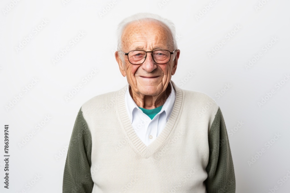 Portrait of a cheerful elderly man in his 90s wearing a chic cardigan in white background Portrait of a cheerful elderly man in his 90s wearing a chic cardigan in white background