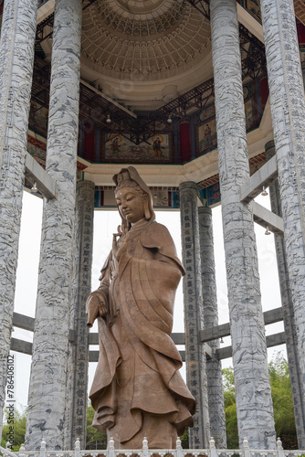 The Buddha Statue of the Chinese Buddhist Temple Kek Lok Si to the City of George Town on Penang in Malaysia