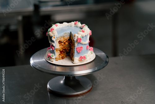 in professional kitchen the finished cake stands on a stand cross-sectional demonstration