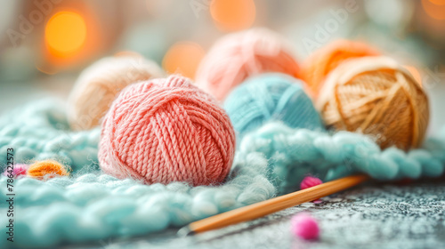 Colorful knitting yarn thread with needles background. Close up. Knitting shop, hobby, Yarn for knitting. Needlework background. Many colorful balls of wool and cotton yarn for knitting