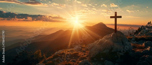 A silhouette cross on a sunset-colored Calvary mountain background. A concept for Easter.