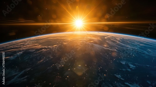 visually striking image of Earth seen from space, with the sun rising over the curvature of the planet photo
