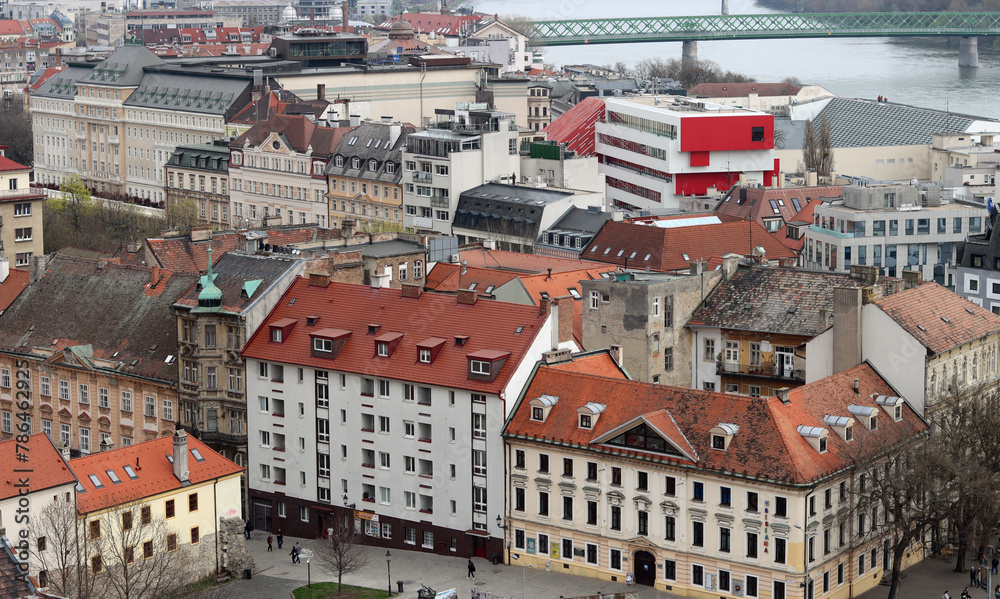 View of Bratislava from the Old Town. Red roofed houses from above. Spring in Europe. 