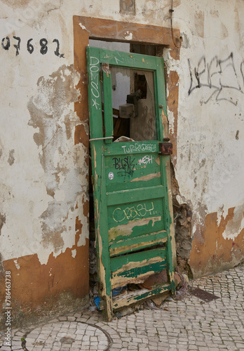 old aged wooden green door