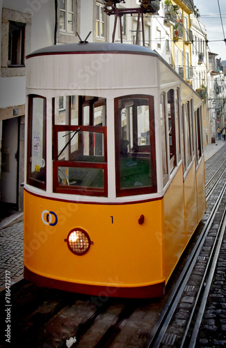 View of slopes and tram, Bica elevator, Lisbon, Portugal. Old street, sightseeing, cable car