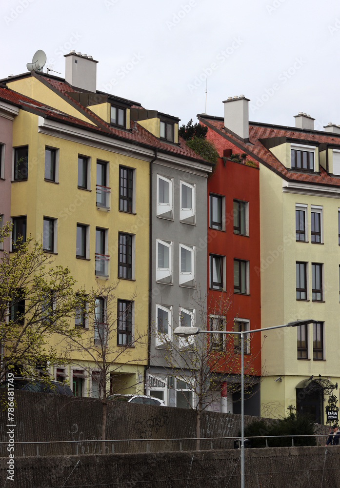 Naklejka premium Colorful facades of houses close up photo. Architecture of Europe. 