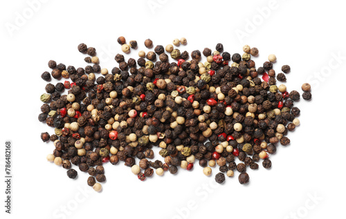 Aromatic spices. Pile of different peppers isolated on white, top view