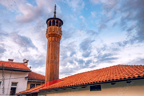 architectural marvels of Sarajevo's wooden mosque minarets, reflecting the intricate craftsmanship of Ottoman design and Bosnian culture.