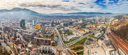 Sarajevo's cityscape unfolds majestically from the viewpoint, offering a stunning backdrop for tourists and locals alike to enjoy. photo