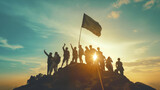 Silhouettes of a group of entrepreneurs standing on a mountain peak, raising a flag against a stunning sunrise