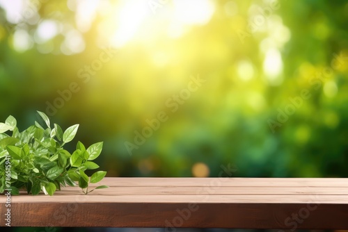 Spring Flowers, Leaves, and Plants on Wooden Table Against Green Blur Bokeh Background © RBGallery