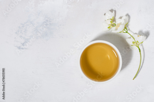 pialat with green tea on a white background and jasmine