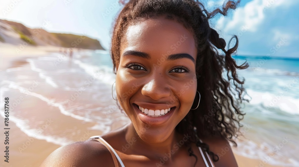 Beautiful black young woman taking selfie picture walking on the beach - Delightful female smiling at camera outside - Summer vacation, technology and healthy lifestyle concept 