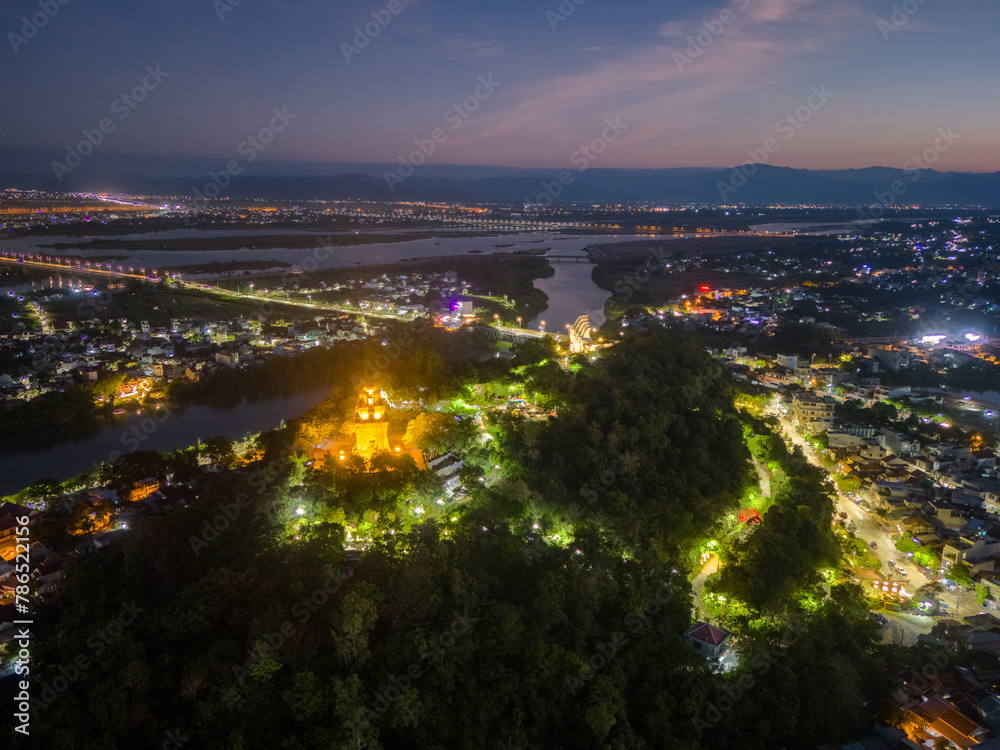 Aerial view of Nhan temple, tower is an artistic architectural work of Champa people in Tuy Hoa city, Phu Yen province, Vietnam. Sunset view.