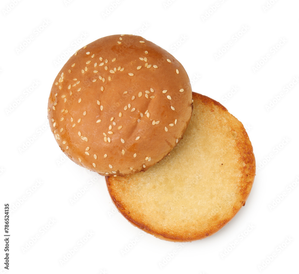 Halves of grilled burger bun isolated on white, top view