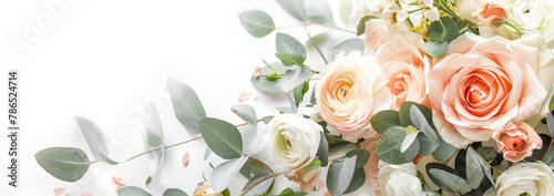 Bouquet of pink roses and eucalyptus branches on white background. Flat lay, top view. Mother's day background. 