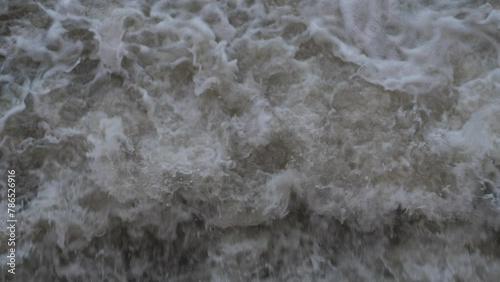 waterfall on the river. natural disaster on the river. natural disasters, spring flood on a fast river photo