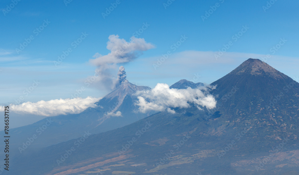 Active Volcano fuego erupting grey smoke cloud in guatemala.