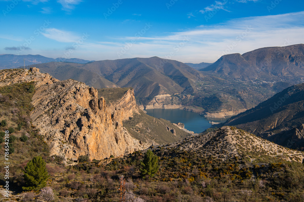 Embalse de Canales Reservoir in Guejar Sierra, province of Granada, Andalusia, Spain. Picturesque landscape view above. Spain. Sierra Nevada mountains.