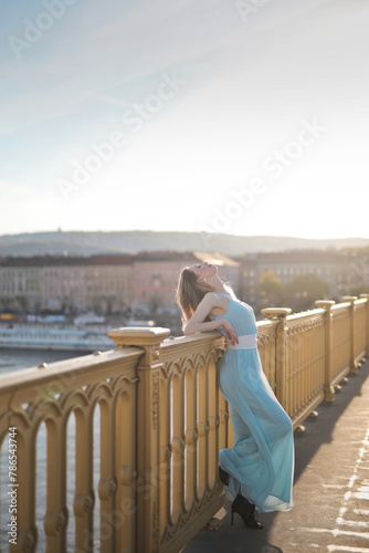 young woman on a bridge in Budapest