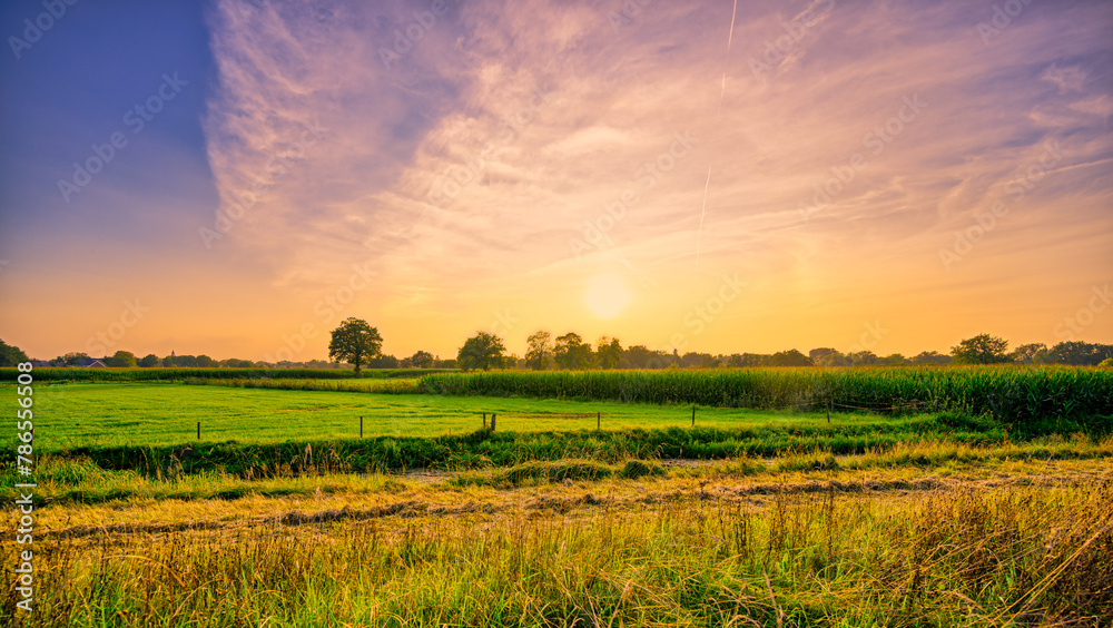 Sunset over the meadows near the rural village of Aarle-Rixtel, The Netherlands.