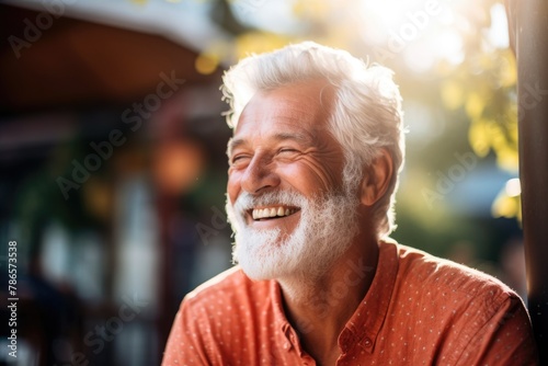 Face portrait of a smiling senior man © SD Danver