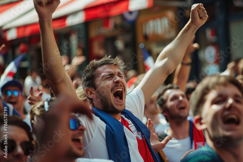 Exuberant fans in white and blue celebrating on a sunny Parisian street, vibrant