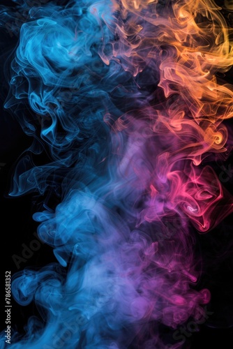 Close up of colored smoke on black background. Ideal for abstract backgrounds