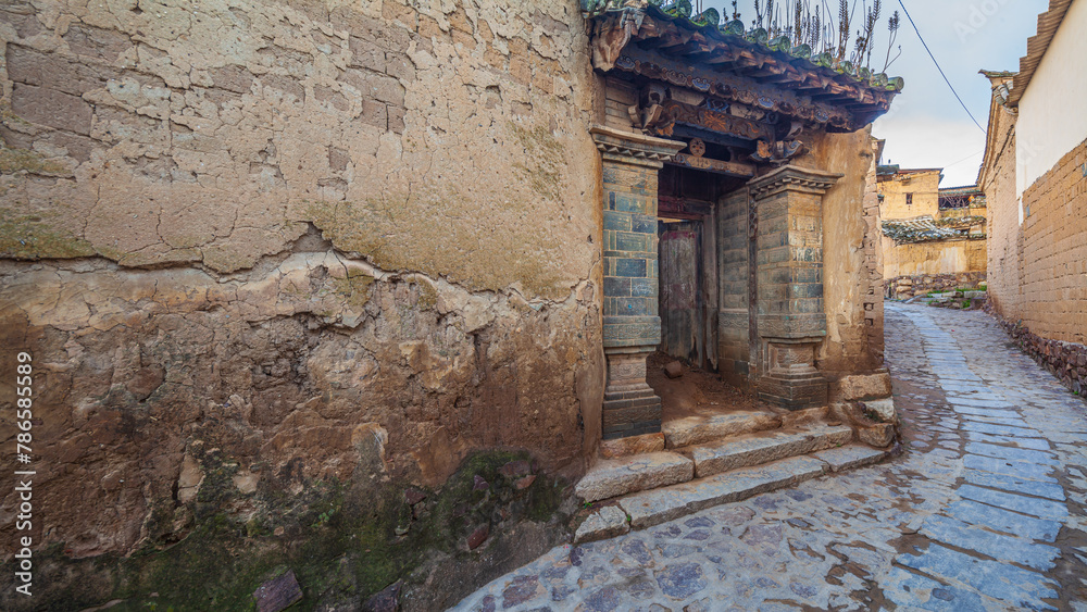 Cobble stone street in the historic town of Tuanshan, Yunnan province China Cobble stone street in the historic town of Tuanshan, Yunnan province China