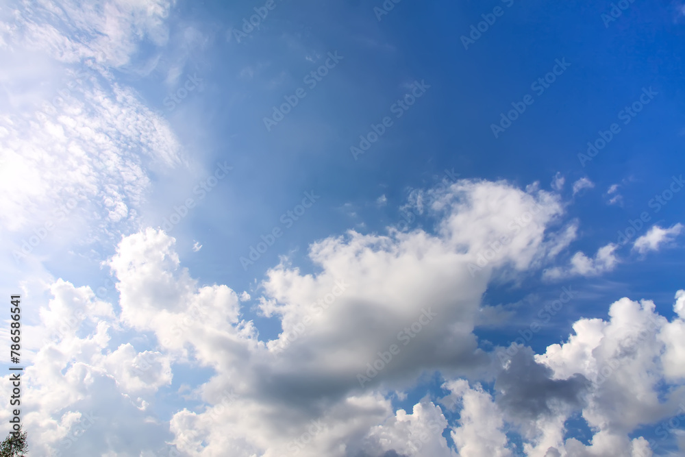 Fototapeta premium Sky with white clouds. Cloudy weather in summer day.