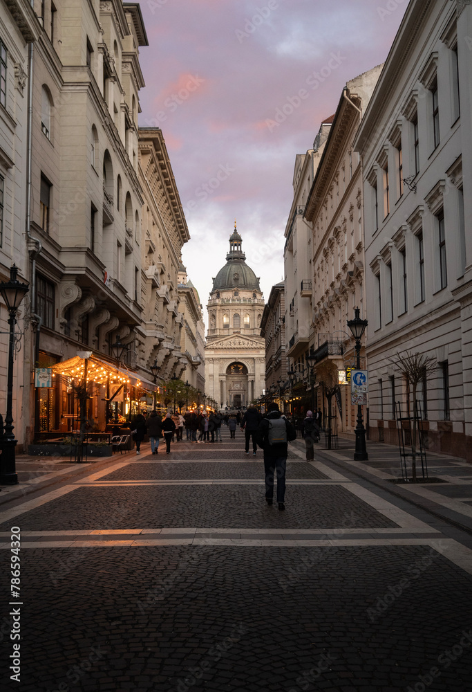 St. Stephen Basilica dome rising above old buildings in the city center of Budapest, Hungary St. Stephen Basilica dome rising above old buildings in the city center of Budapest, Hungary