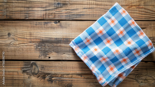 Checkered napkin on a wooden table