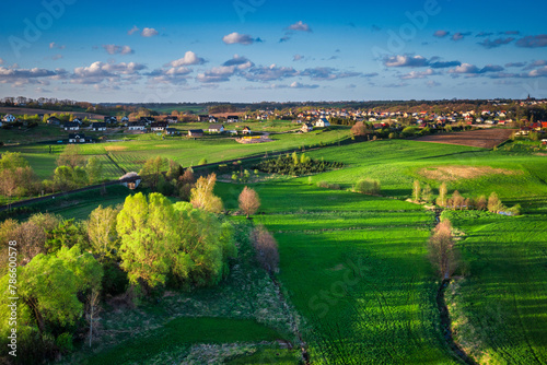 Aerial landscape of the green fields in northern Poland at spring time.