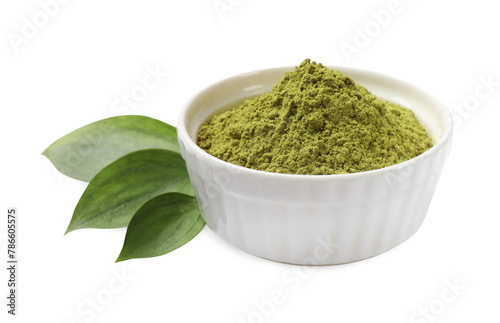 Henna powder in bowl and green leaves isolated on white