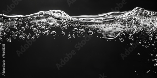 Close-up shot of water bubbles in monochrome. Suitable for scientific publications or abstract backgrounds