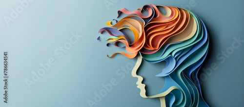 Concept of self care, happiness, harmony, creative mind. Colored paper cutout person head on blue background. Copy space