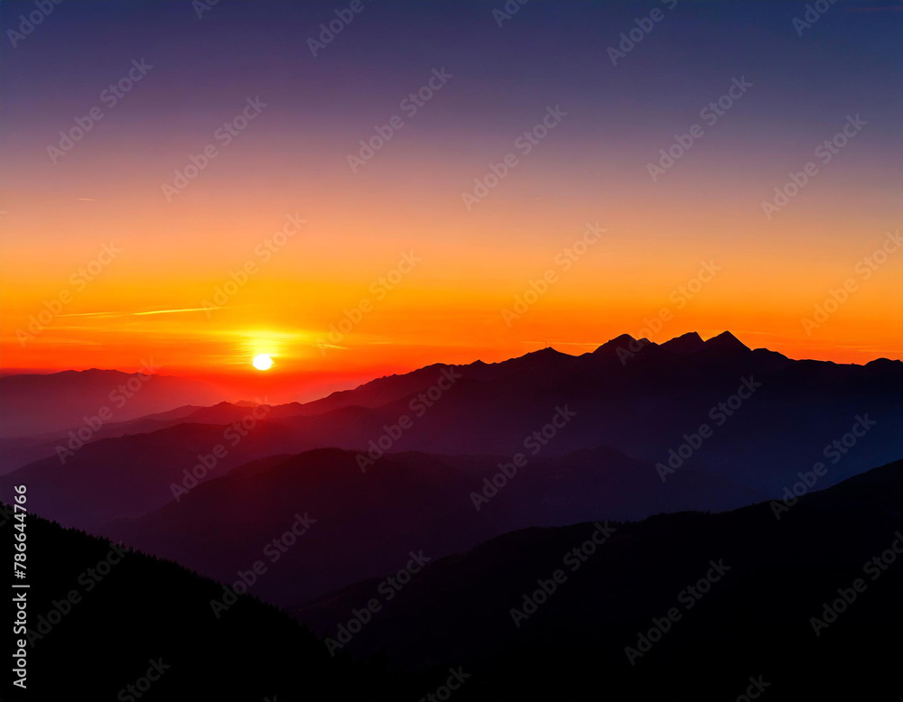 Fototapeta premium the sun is setting over a mountain range with mountains in the foreground and a red sky in the background