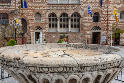 Thessaloniki, Greece - October 12, 2021: Font in front of Church of Saint Demetrius - Hagios Demetrios in Thessaloniki city, Greece photo