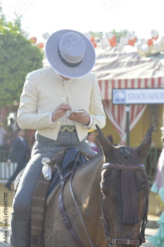 Horse riders in the world famous April Fair of Seville, Andalusia, Spain