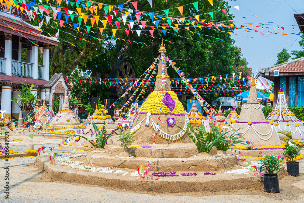 Thai people come to build the Sand Pagoda for return the sand to the temple on Songran festival at Ratchaburana temple in Phitsanulok Thailand.