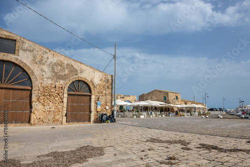 Old tuna factory in Marzamemi village on the island of Sicily, Italy photo