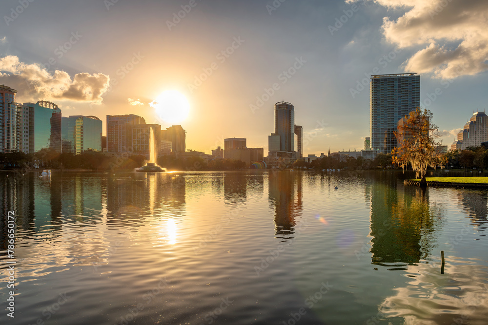 Orlando city skyline at sunset with fountain and cityscape, Florida, USA