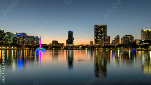 Orlando city skyline at night. Panoramic view of Orlando  city in Lake Eola, Florida, USA