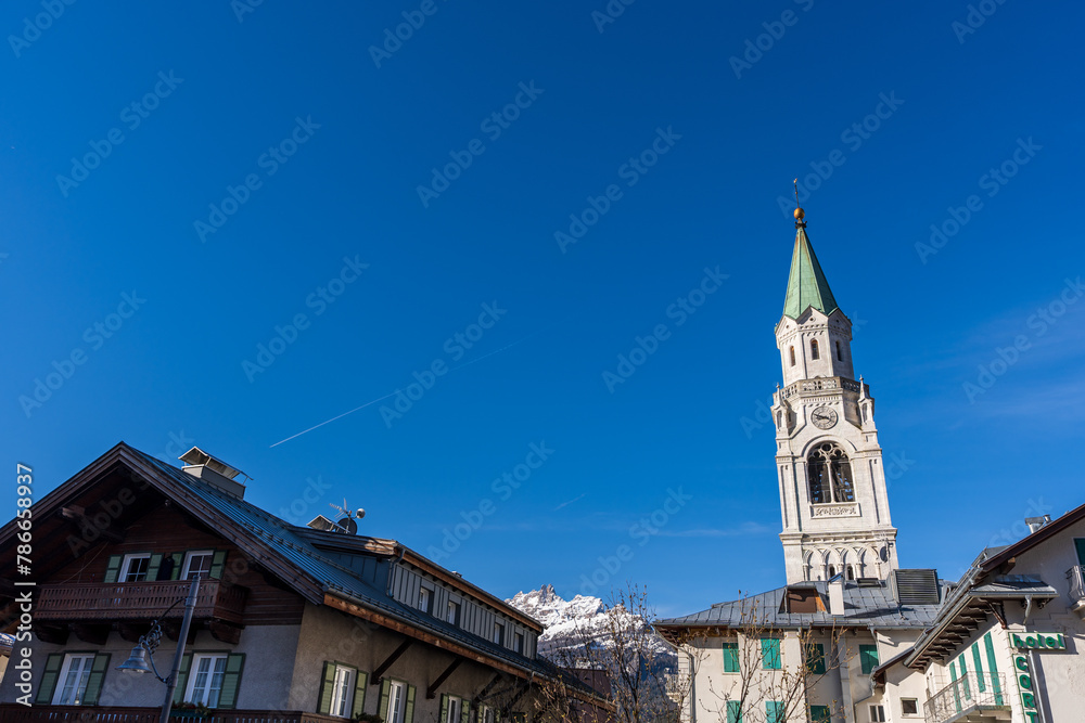 View of the bell tower of the Basilica of Saints Philip and James in Cortina d'Ampezzo