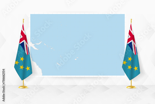 Map of Tuvalu and flags of Tuvalu on flag stand. photo